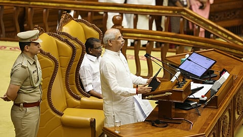 Governor Rajendra Viswanatha Arlekar delivers the policy address in the Assembly on Friday. Speaker Thiruvanchoor Radhakrishnan is also seen.