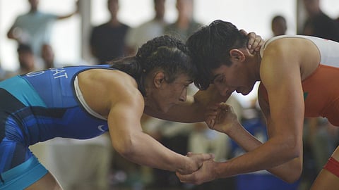 Vinesh Phogat (L) in action during the trials on Saturday