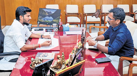 HR&CE Minister S Ramesh interacting with TNIE’s senior reporter on Sunday. A book on Periyar’s ideology is seen on the table
