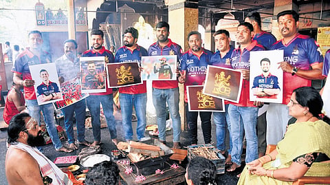 RCB fans perform a special pooja and homa at the Amruteshwara Swamy temple in Mysuru on Saturday for the victory of their team in the IPL final against Gujarat Titans being held at Ahmedabad on Sunday.