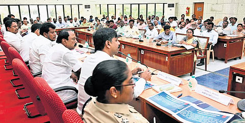 Minister KA Sengottaiyan takes part in a consultation meeting with department officials at the Erode Collectorate on Saturday