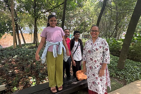 Jayaradha Veerasamy, right, and Saravanan Ganasan, second left, stand with their 12 years-old daughter Saaradha Saravanan, left, and their 15 year-old son Aadhavan Saravanan at a park in Petaling Jaya, near Kuala Lumpur, Malaysia Monday, June 1, 2026.