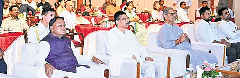 Chief Minister Mohan Charan Majhi listening to Mann Ki Baat with Governor Hari Babu Kambhampati and cabinet colleagues at Lok Bhavan