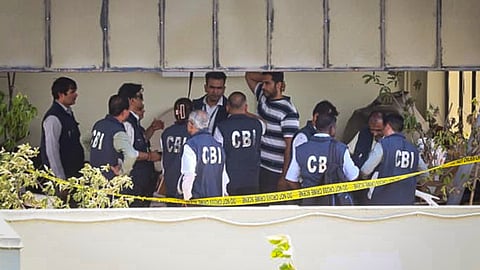 Central Bureau of Investigation (CBI) officials recreate the crime scene in Twisha Sharma death case, at the accused Giribala Singh's residence, in Bhopal, Madhya Pradesh, Monday, June 1, 2026. Model-actress Twisha Sharma's husband Samarth Singh, in striped tshirt, also seen.
