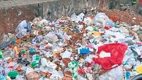 Garbage dumped on railway land near Aluva railway station.