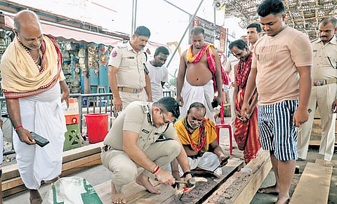 IG Satyajit Naik tries his hands at chariot making in Puri on Sunday