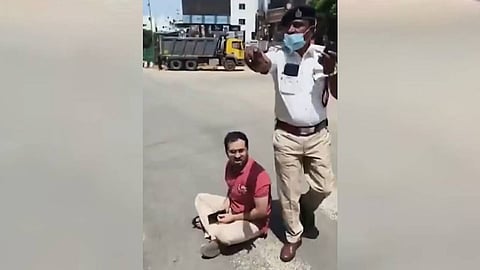 A man stuck in traffic with his pregnant wife protested on road, as traffic was halted for Governor Thaawarchand Gehlot’s convoy, at Old Airport Road in Bengaluru on Sunday.