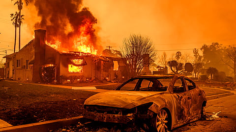 Flames burning through a house in Los Angeles county, Southern California in January, 2025