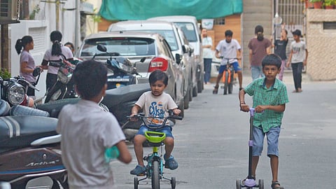 Children enjoying pleasant afternoon in Delhi on Monday.