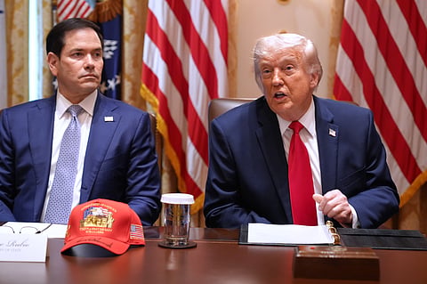 President Donald Trump, next to Secretary of State Marco Rubio, speaks during a Cabinet meeting at the White House, Wednesday, May 27, 2026, in Washington