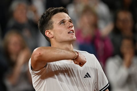 Czech Republic's Jakub Mensik reacts after winning the quarterfinal tennis match against Brazil's Joao Fonseca at the French Open in Paris, Tuesday, June 2, 2026.