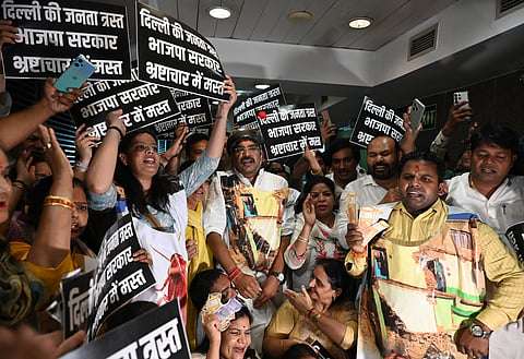 The AAP holds demonstration at the MCD Civic Centre over alleged irregularities in the Saket building construction on Tuesday.