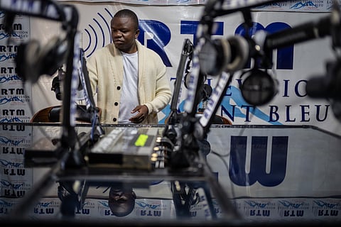 Verité Johnson works at a community radio station, providing daily awareness and updates on Ebola in Bunia, Congo, Thursday, June 4, 2026.