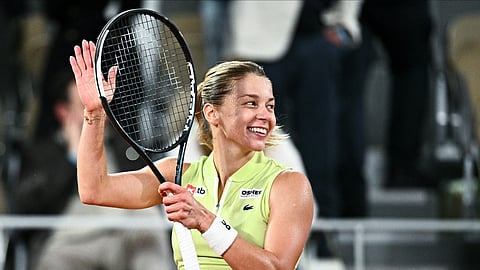 Poland's Maja Chwalinska celebrates after winning against Russia's Diana Shnaider at the end of their women's semi final singles match on day 12 of the French Open tennis tournament on June 4, 2026.