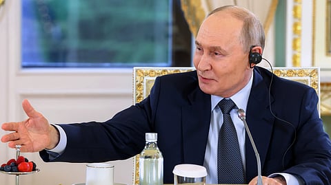 Russian President Vladimir Putin gestures during a meeting with representatives of international news agencies on the sidelines of the St. Petersburg International Economic Forum at the Constantine Palace in St. Petersburg, Russia, on Thursday, June 4, 2026.