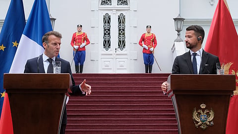 French President Emmanuel Macron, left, speaks during a press conference after talks with Montenegro's President Jakov Milatovic, right, in Cetinje, Montenegro, Thursday, June 4, 2026.