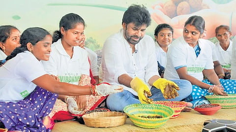 Deputy CM Pawan Kalyan makes seed balls at a programme organised to mark World Environment Day at the Butterfly Park in Mulapadu of NTR district.