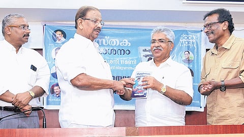 Congress leader K Sudhakaran releasing the book ‘VSnu Oppam Ente Dinangal’ by handing over its first copy to retired High Court judge Justice Kemal Pasha at the Press Club in Thiruvananthapuram on Saturday. Senior IAS officer B Ashok (left) and author Suresh Kumar (right) are also seen.