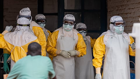 Health workers prepare for duty at the Mongbwalu treatment centre in Mongbwalu, Congo, Friday, June 5, 2026.