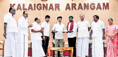 M K Stalin welcoming workers from other parties into the DMK at Anna Arivalayam in Chennai on Saturday.