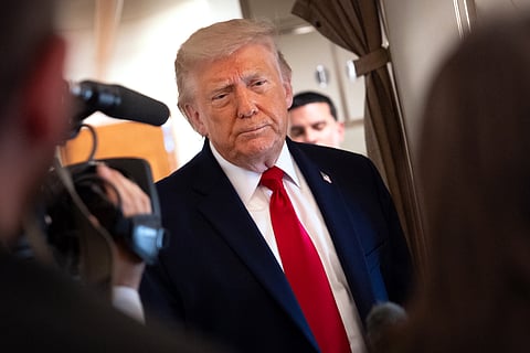 President Donald Trump speaks to reporters aboard Air Force One en route from Joint Base Andrews, Md., to Eau Claire, Wis., Friday, June 5, 2026.