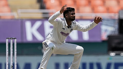 India's Manav Suthar reacts after bowling a delivery on day three of the cricket test match between Afghanistan and India in New Chandigarh, India, Monday, June 8, 2026.