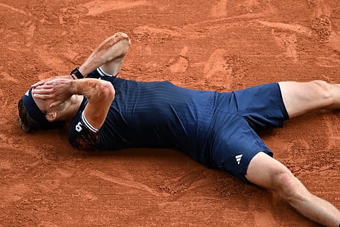 Germany's Alexander Zverev reacts after winning the final tennis match against Italy's Flavio Cobolli at the French Open in Paris, Sunday, June 7, 2026.