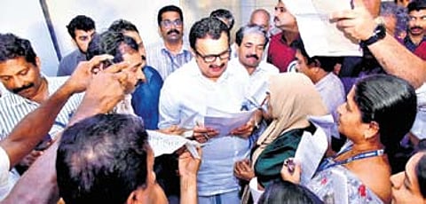 People submitting petitions to Health Minister K Muralidharan, who arrived to
inaugurate the state-level ‘Kayakalpam’ public outreach programme in Kozhikode
on Tuesday