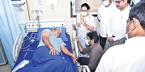 Deputy Chief Minister K Pawan Kalyan consoles an injured steel plant worker at hospital in Visakhapatnam on Tuesday