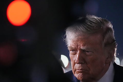 President Donald Trump talks with reporters before boarding Air Force One at John F. Kennedy International Airport in New York, early Tuesday, June 9, 2026.