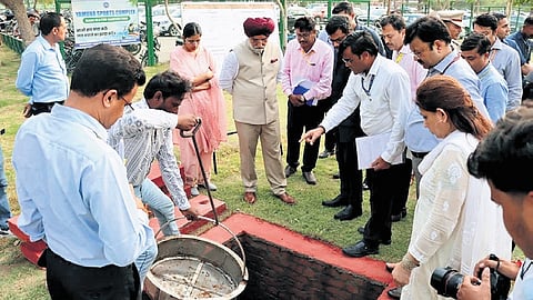 L-G reviews on-site rainwater harvesting system at Yamuna Sports Complex.
