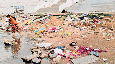 Waste littered near Tungabhadra river in Hampi.