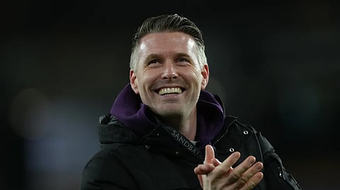 Wolverhampton Wanderers’ head coach Rob Edwards celebrates after the English Premier League soccer match between Wolverhampton Wanderers and Liverpool in Wolverhampton, England, on March 3, 2026.