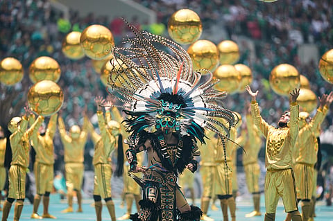 Performers on the pitch during the opening ceremony before the start of the World Cup Group A soccer match between Mexico and South Africa in Mexico City, Thursday, June 11, 2026.