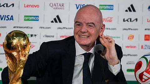 FIFA President Gianni Infantino gestures during a press conference with the World Cup trophy on the eve of the opening match of the 2026 World Cup