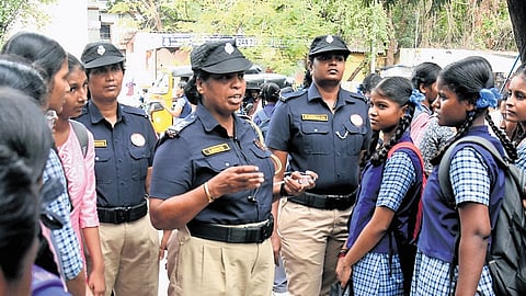 Singappen Special Task Force officers interact with students