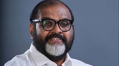 Transport Minister CP John