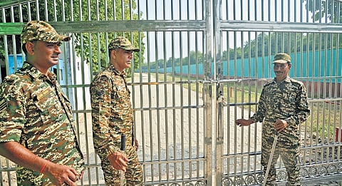 Personnel stand guard as Centre takes possession on Saturday