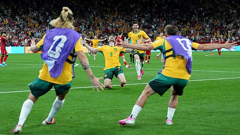 Australia's Connor Metcalfe (center) celebrates with teammates after scoring their second goal during the World Cup Group D soccer match between Australia and Turkey in Vancouver, British Columbia, Saturday, June 13, 2026.