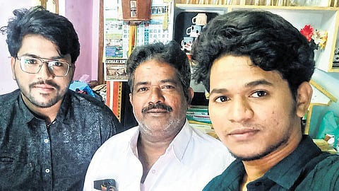 Mahaboob Basha (C) with his two sons