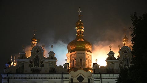 The roof of the Dormition Cathedral of the Kyiv-Pechersk Lavra is on fire during the overnight Russian attack on Kyiv, Ukraine Monday, June 15, 2026.