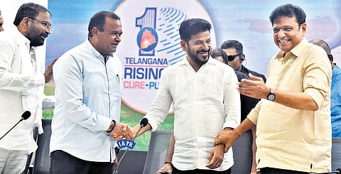 Chief Minister A Revanth Reddy shares a lighter moment with his Cabinet colleagues Komatireddy Venkat Reddy and D Sridhar Babu during a press conference at the Secretariat in Hyderabad on Monday