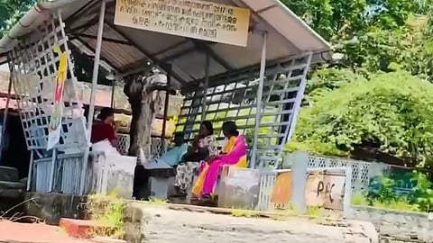 Women commuters waiting at the Kuppapuram Hospital Boat jetty in Alappuzha district
