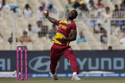 West Indies’ Shamar Joseph bowls a delivery during the T20 World Cup cricket match between West Indies and Italy in Kolkata, India, on Feb. 19, 2026.