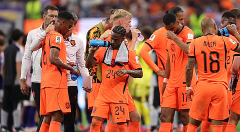 Netherlands players during the hydration break against Japan