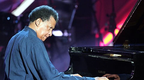 Musician Abdullah Ibrahim plays on a grand piano during the Adolf-Grimme awards gala in Marl, western Germany, March 18, 2005.