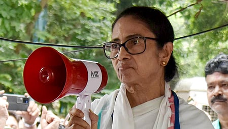 Kolkata: Former West Bengal Chief Minister and TMC supremo Mamata Banerjee speaks during a protest rally against the alleged attack on party leaders near a bus stop in the Dharamtala area of Kolkata on Tuesday, June 2, 2026.