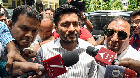 In this photo from June 15, 2026, TMC MP Abhishek Banerjee arrives at the Enforcement Directorate (ED) office in connection with the alleged primary school jobs scam case, in Kolkata.