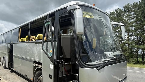 This handout picture posted on the official Telegram channel of Yegor Kovalchuk, acting governor of the Bryansk region, on June 17, 2026 shows the site of a drone strike on a bus at a highway in the Bryansk region.