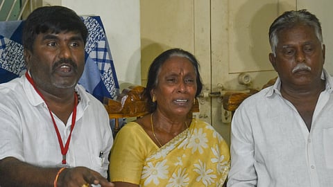 Gade Vijayalakshmi, mother of rowdy-sheeter Sai Krishna, and his family members speak to the media in Vijayawada on Wednesday.